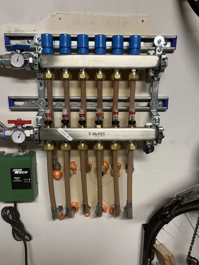 Plumber performing Gas Line Installation at a residential property in Dana